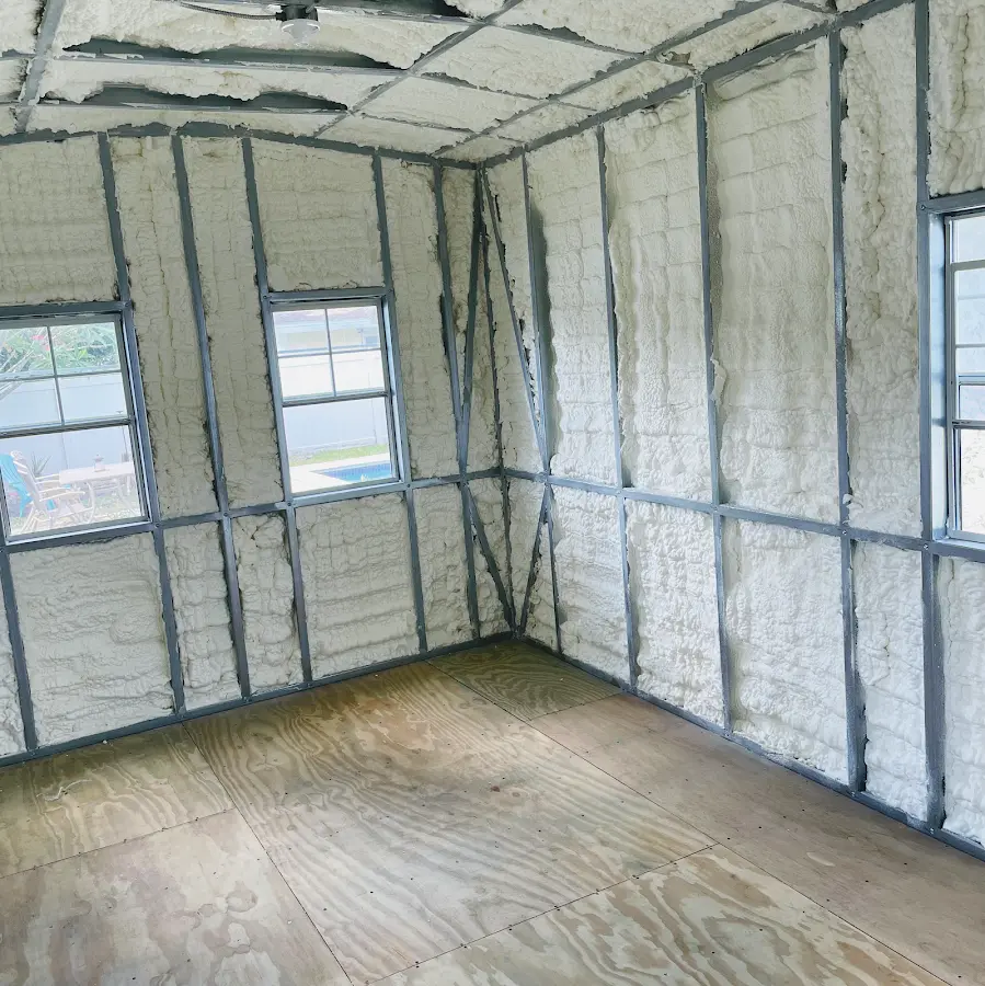 Closed-cell spray foam insulation applied to wall cavities in a residential project in West Jefferson